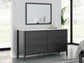 Cadmori Queen Upholstered Panel Bed, Dresser, Mirror, Chest and Nightstand