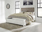 Kanwyn Queen Upholstered Panel Storage Bed